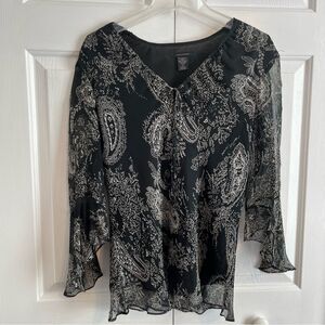Anne Carson Vintage
100% silk black blouse
womens size Large